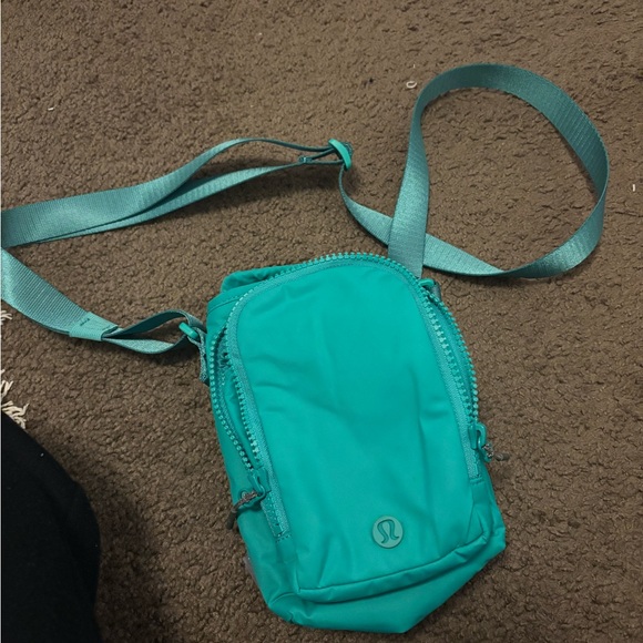 lululemon athletica Handbags - Lululemon Teal green Crossbody water bottle Bag